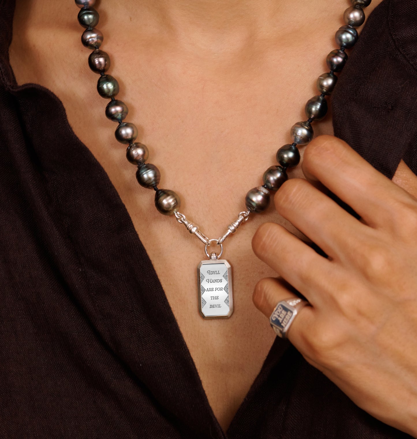 Silver Idyll Hands Swivel Pendant